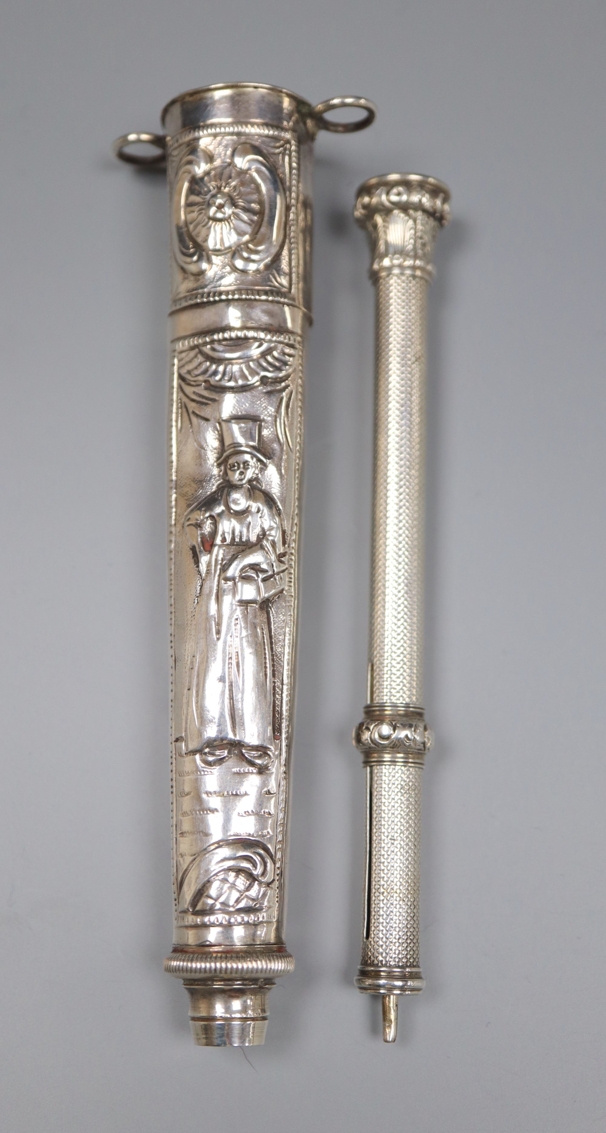 Two white metal propelling pencils, including engine turned with amethyst coloured intaglio set terminal, 93mm.